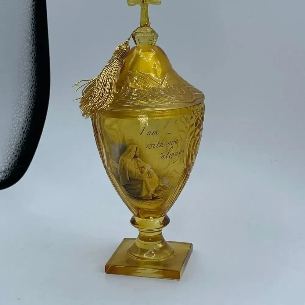 Vintage Amber Glass Religious pedestal goblet with music box lid.